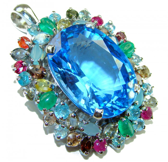 Oceania oval cut 32.8 carat Swiss Blue Topaz .925 Sterling Silver dipped in rhodium Handcrafted Pendant Brooch - Close-up of Oceania oval cut 32.8 carat Swiss Blue Topaz pendant.