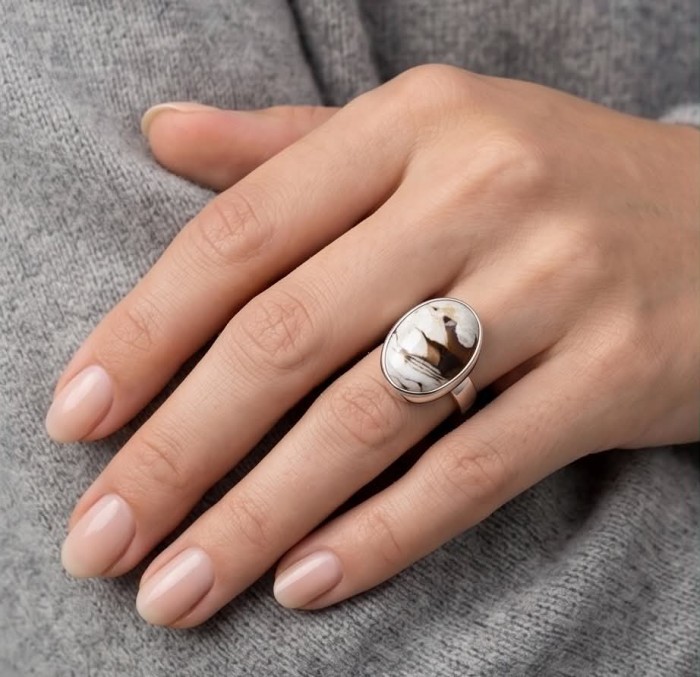 Exotic Petrified Palm Wood .925 Sterling Silver LARGE Ring size 7 adjustable - Ring with petrified palm wood worn on hand, showcasing design.