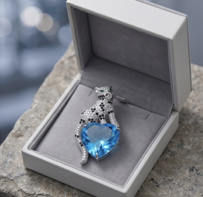 Precious Cheetah authentic 38.5 carat Swiss Blue Topaz .925 Sterling Silver Handcrafted pendant brooch - Cheetah brooch side view with blue topaz in jewelry box