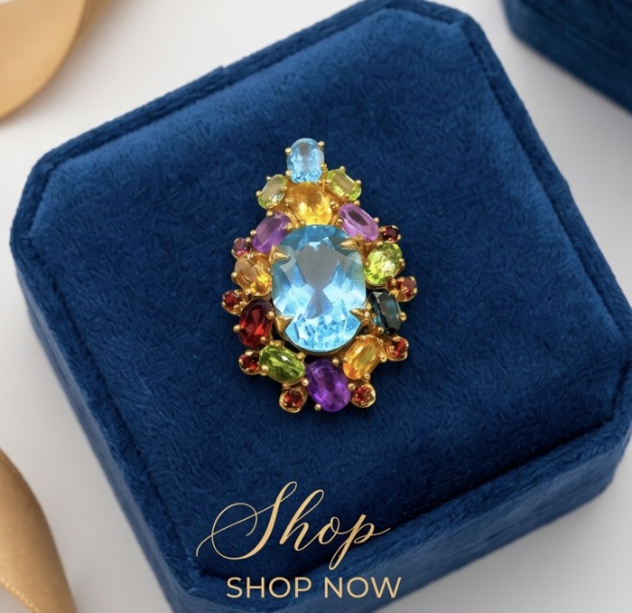 Majestic - Vintage style oval cut 15.8 carat Swiss Blue Topaz .925 Sterling Silver DIPPED IN 22 carat Gold handmade Pendant Brooch - Vintage style ring with blue topaz stone on blue velvet box