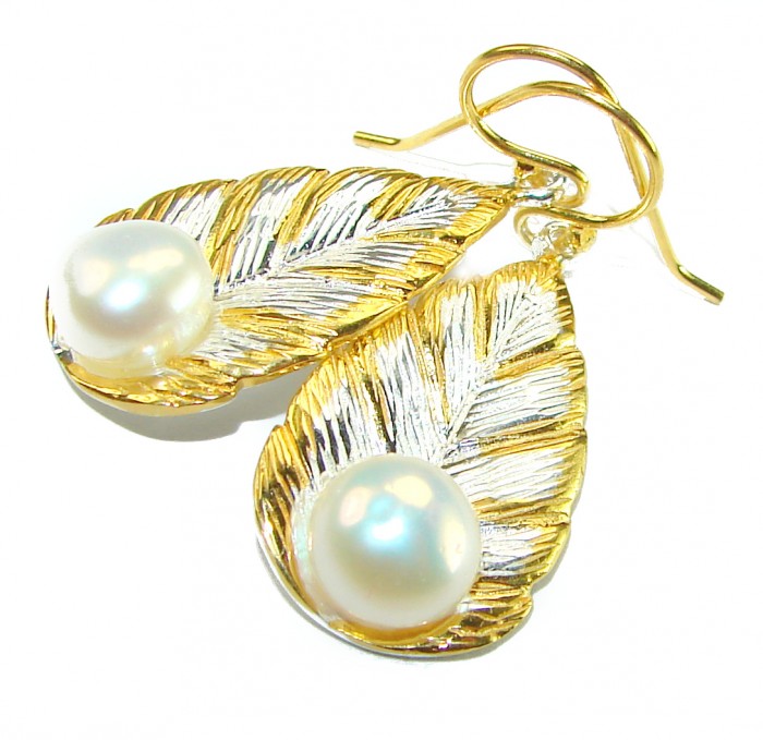 Sublime Blister Pearl 14K Gold over .925 Sterling Silver handcrafted Earrings - Leaf-shaped pearl earrings, close-up, gold and silver detailing.