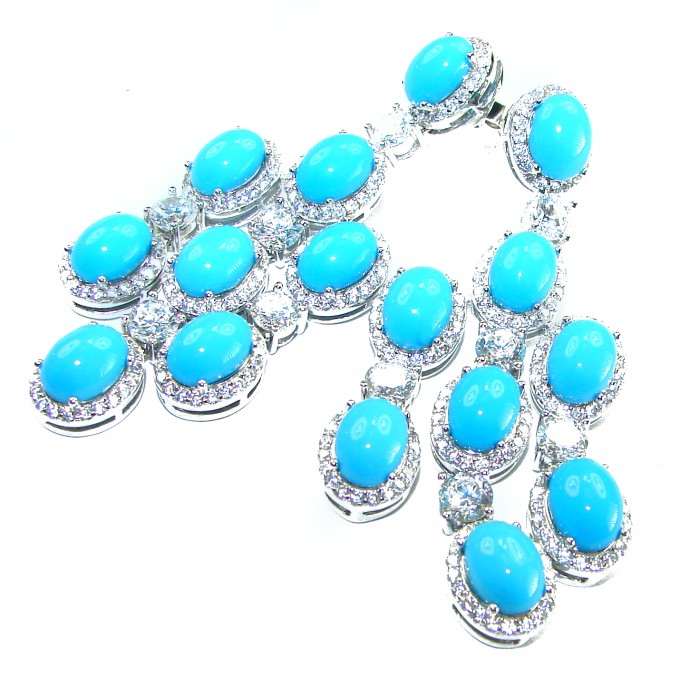 Great quality authentic Sleeping Beauty Turquoise 18K Whute Gold over .925 Sterling Silver handcrafted Earrings - Side view of Sleeping Beauty Turquoise and diamond earrings.