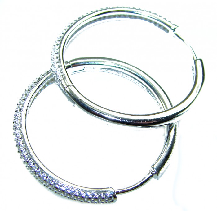 Allure Natural 8.2 carat White Topaz .925 Sterling Silver handcrafted hoop earrings - Sterling silver hoop earrings studded with white topaz, side view.