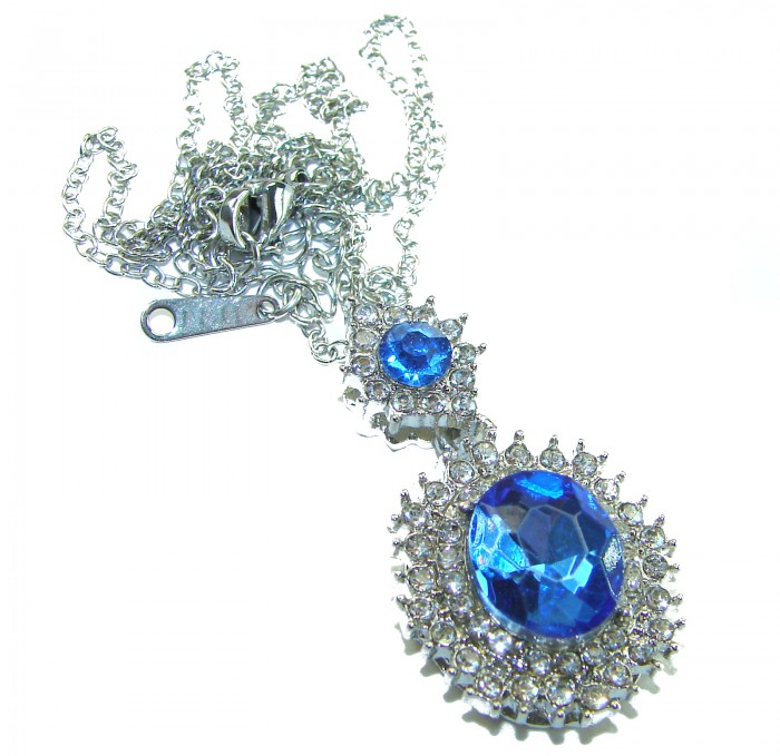 Pacifica 15.5 carat Swiss Blue Topaz .925 Sterling Silver Handcrafted necklace - Silver necklace with blue topaz stones in close-up view.