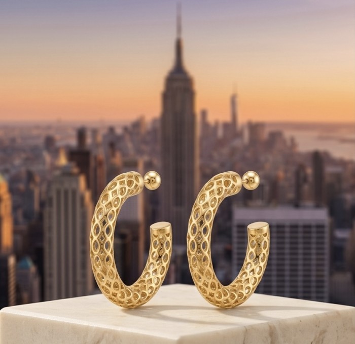 Dubai Style - .925 Sterling Silver dipped in 22K Gold handmade Earrings - Gold hoop earrings with lattice design, cityscape background.