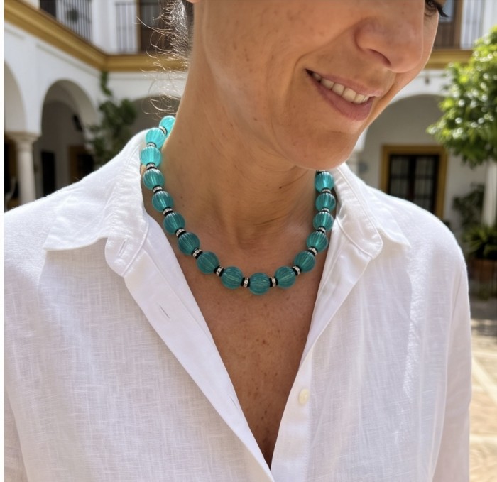 Art Deco - Rio de Janeiro - 52.2 carat carved Apatite .925 Sterling Silver handmade necklace - Necklace worn close-up showcasing carved apatite stones.