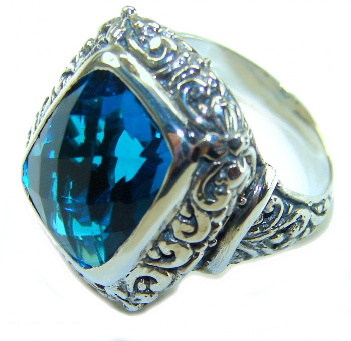 Rare Bali Made - 12.5 carat London Blue Topaz .925 Sterling Silver handmade Ring size 6 - Close-up of ornate silver ring with a large blue topaz stone.