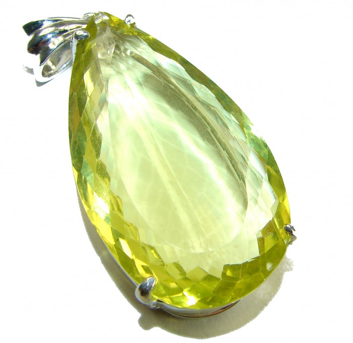 Goddess of Light - 58.5 carat Large Lemon Topaz .925 Sterling Silver handmade Pendant - Close-up of Goddess of Light lemon topaz pendant with silver clasp.