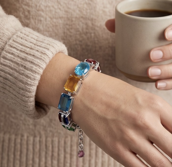 Tutti Frutti 49.5 CARAT MULTIGEM .925 Sterling Silver brilliantly handcrafted Bracelet - Tutti Frutti multigem bracelet worn on wrist, holding a coffee mug.