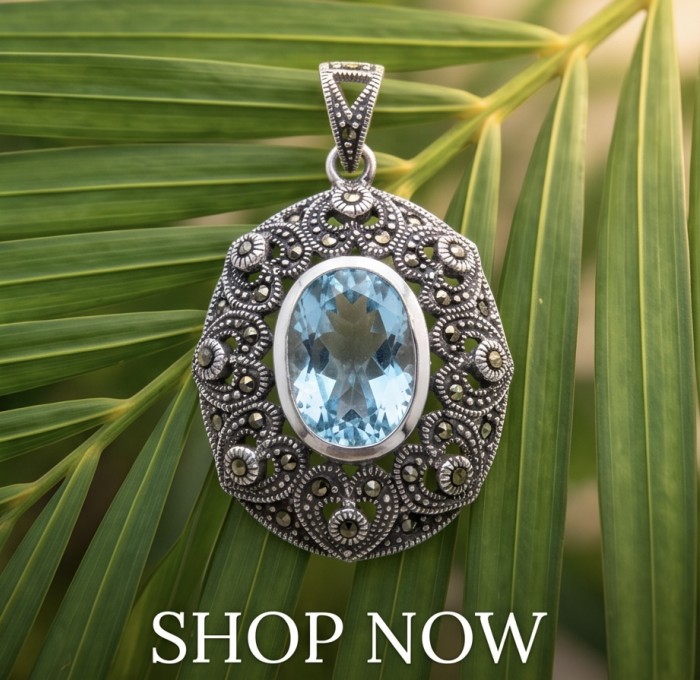 Angelina 11.9 carat authentic Aquamarine .925 Sterling Silver Handcrafted pendant - Aquamarine pendant on leaves, front view, sterling silver, shop now text