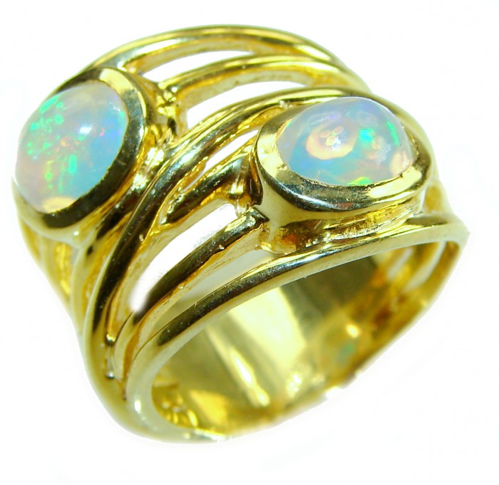 Golden Galaxy Genuine 7.8 carat Ethiopian Opal 14K White Gold over .925 Sterling Silver handmade Ring size 8 - Side view of Golden Galaxy opal ring with 14K gold setting