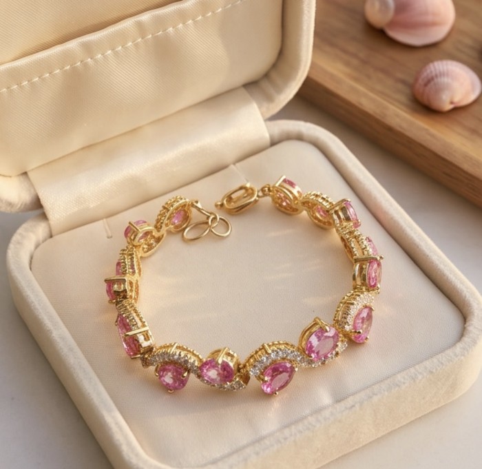 Luxurious 31.4 carat Pink Sapphire .925 Sterling Silver dipped in 18K Gold handcrafted Bracelet - Pink sapphire bracelet in box, top view.