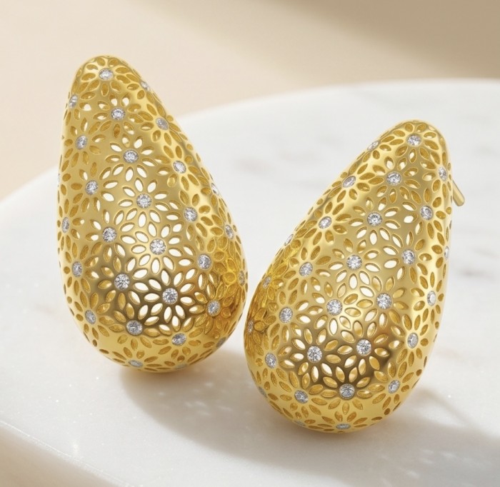 Dubai Style - Golden fancy Drops .925 Sterling Silver dipped in 22K Gold handmade Earrings - Golden filigree drop earrings, front view on a marble surface