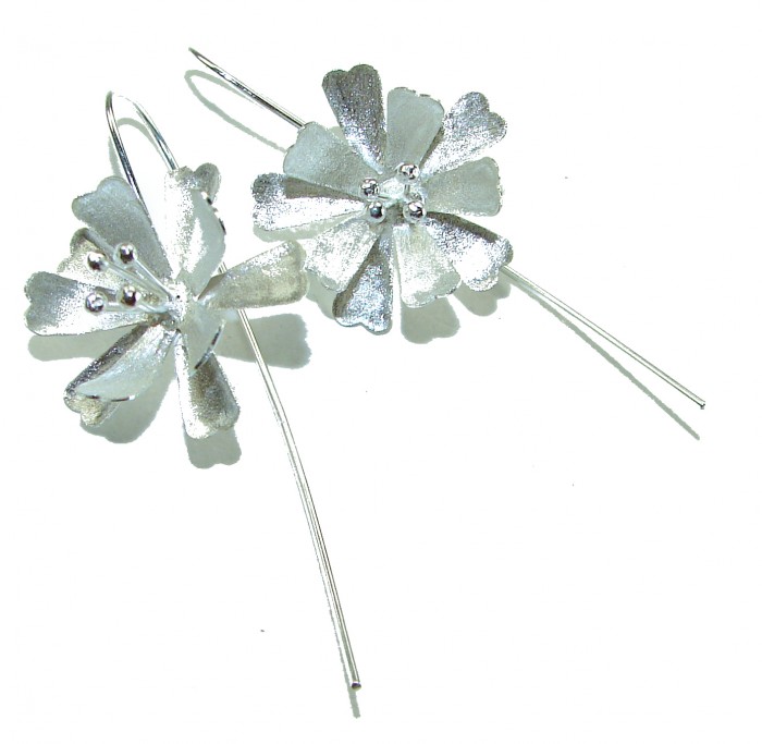Silver Flowers Italy made .925 Sterling Silver Earrings - Silver flower earrings on a white background, angled front view.