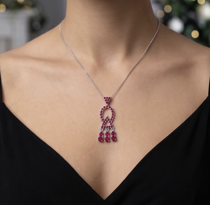 Precious - Art Deco 8.2 carat Ruby rhodium over .925 Sterling Silver handmade earrings - Ruby necklace worn on neck, front view.