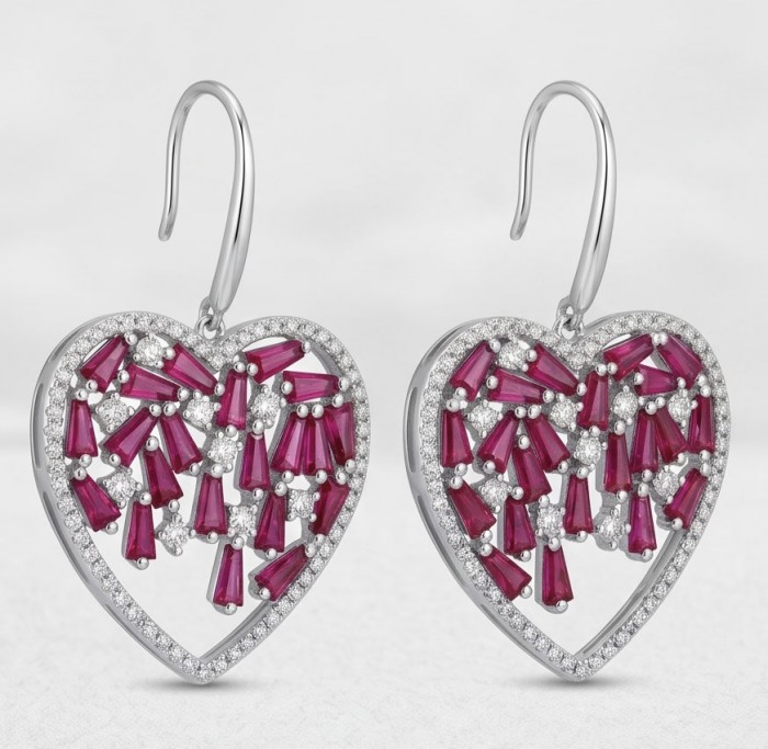 Precious Hearts - authentic 8.5 carat Mozambique Ruby .925 Sterling Silver dipped in rhodium handcrafted Statement Earrings - Heart-shaped earrings with rubies and diamonds, front view.