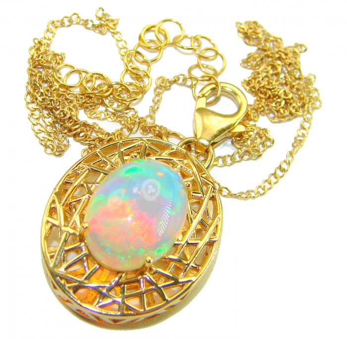 Earth Treasure Authentic 16.8 carat Golden Ethiopian Opal 22K Gold over .925 Sterling Silver handcrafted Statament Necklace - Golden Ethiopian Opal necklace with intricate gold setting and chain detail.