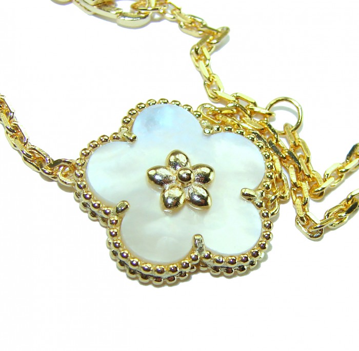 Fantastic Blister Pearl 14K Gold over .925 Silver handmade Bracelet - Close-up of gold and pearl flower pendant on chain.