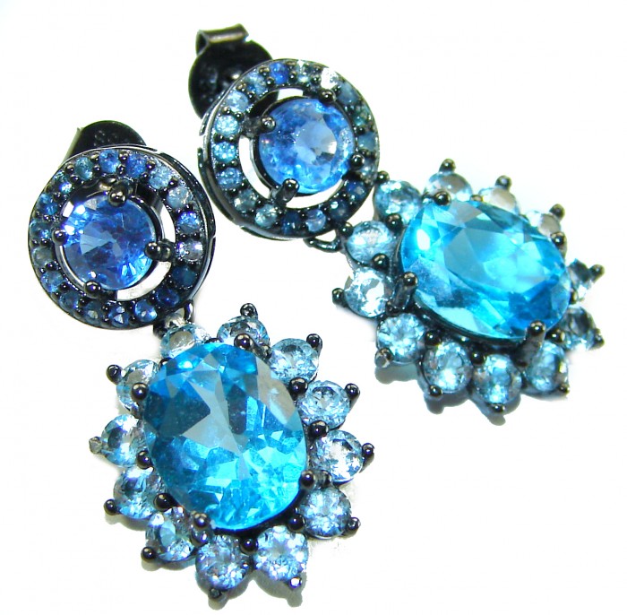 Atlantica 10.7 carat Swiss Blue Topaz .925 Sterling Silver dipped in black rhodium Handcrafted Statement earrings - Close-up of Atlantica Swiss Blue Topaz earrings on white background.