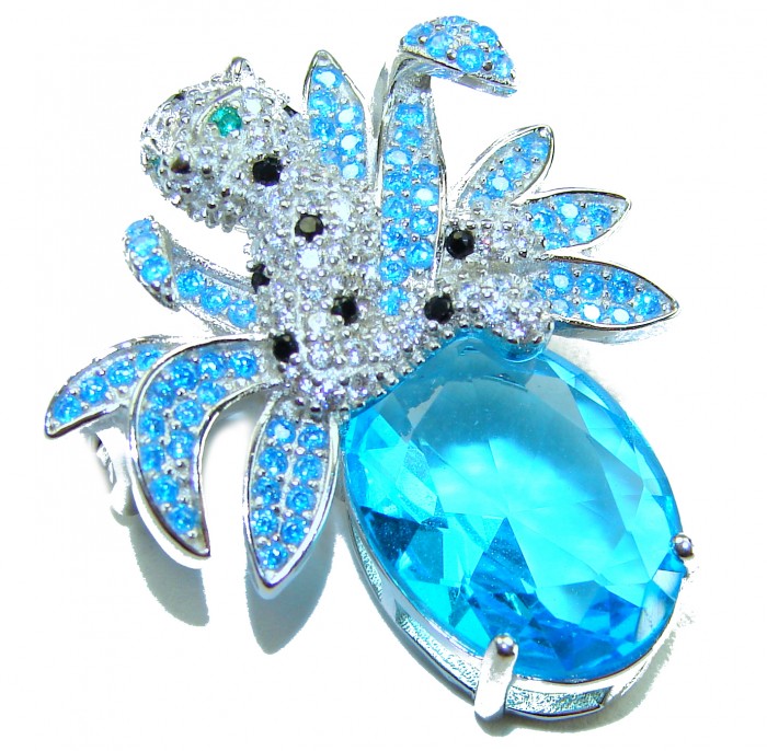 Blue Cheetah authentic 12.5 carat Swiss Blue Topaz .925 Sterling Silver Handcrafted pendant brooch - Blue Cheetah brooch, top view with 12.5 carat Swiss Blue Topaz centerpiece.