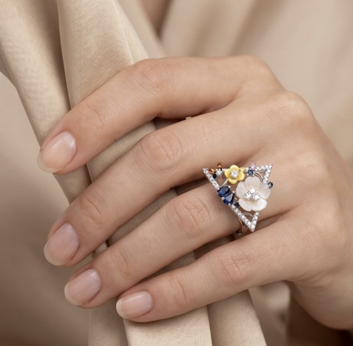 Blister Pearl .925 Sterling Silver brilliantly handcrafted ring s. 8 - Triangular floral Blister Pearl ring worn on hand.