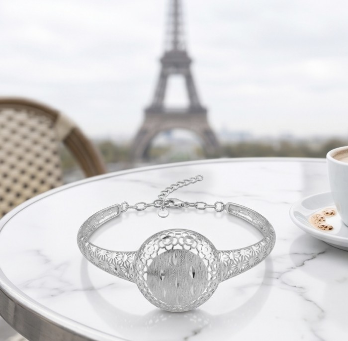 Casablanca - authentic .925 Sterling Silver Bracelet - Casablanca sterling silver bracelet on table with Eiffel Tower background.