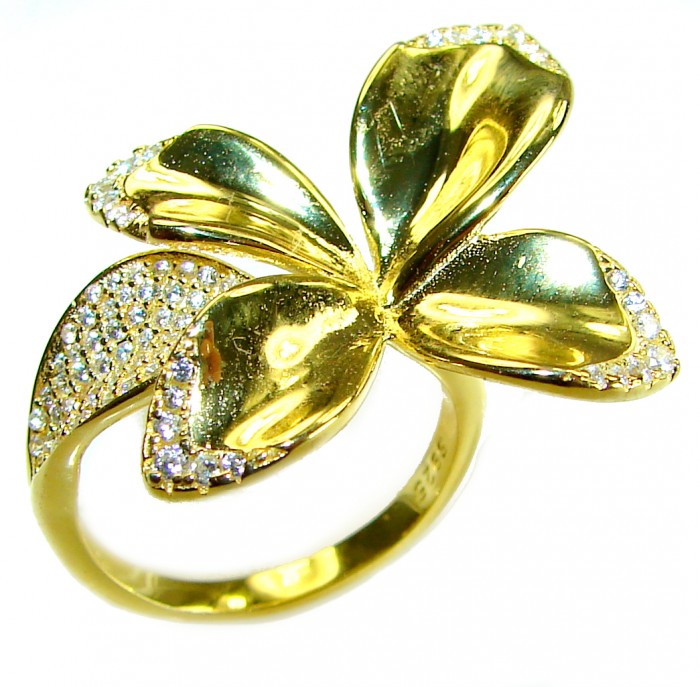 Lotus flower White Topaz highly polished 18K Gold over .925 Sterling Silver Italy made ring s. 7 adjustable - Gold lotus flower ring with topaz, top view, polished finish.