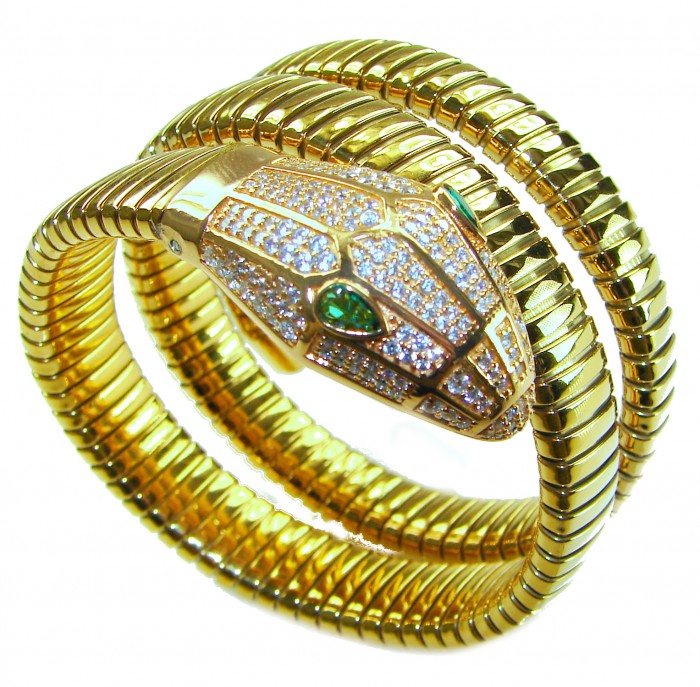 SERPENTINE Precious Snake Genuine 4.2 carat Emerald 925 Sterling Silver dipped in 18K Gold handcrafted Bracelet - Gold snake bracelet with emerald eyes, side view, close-up detail.