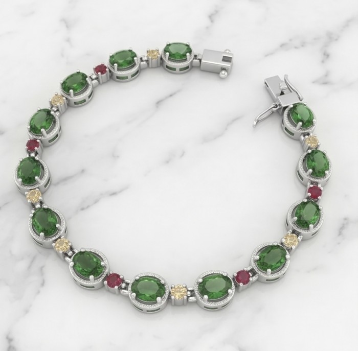 Authentic 17.9 carat Chrome Diopside .925 Sterling Silver handcrafted Bracelet - Top view of a Chrome Diopside sterling silver bracelet on marble surface.