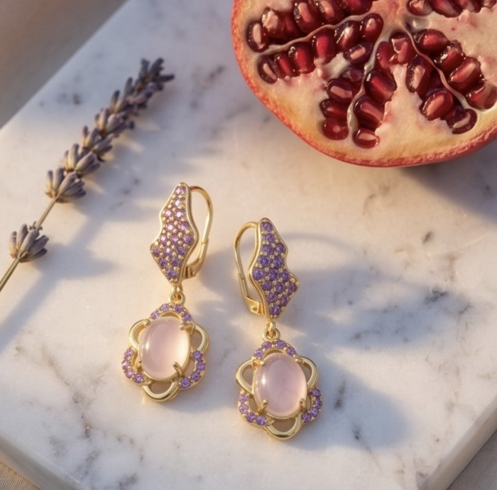 Scarlett 10.5 carat Rose Quartz Amethyst 22K Gold over .925 Sterling Silver handcrafted Statement Earrings - Earrings with rose quartz and amethyst on marble background, top view.