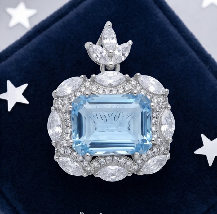 Vintage style boquette cut 12.8 carat Swiss Blue Topaz .925 Sterling Silver DIPPED IN RHODIUM handmade Pendant - Close-up of vintage Swiss Blue Topaz ring with diamond accents.