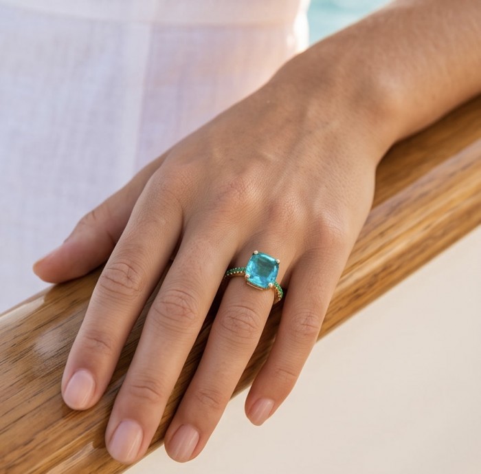 Angelina 8.9 carat authentic Aquamarine 14K Gold over .925 Sterling Silver Handcrafted Ring size 6 1/4 - Aquamarine ring worn on hand against a wooden railing background.