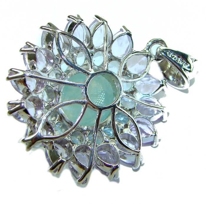 Royal quality genuine 19.8 carat Prehnite rhodium over .925 Sterling Silver handcrafted Pendant - Close-up of a prehnite pendant with rhodium detailing.