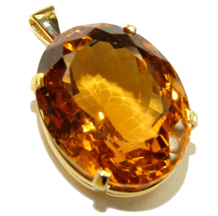 Luxury genuine 39.7 CARAT oval cut Champagne Topaz .925 Sterling Silver dipped in 22K Gold handmade Pendant - Close-up of luxury 39.7 carat oval cut champagne topaz pendant