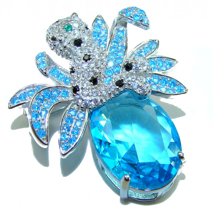 Blue Cheetah authentic 12.5 carat Swiss Blue Topaz .925 Sterling Silver Handcrafted pendant brooch - Blue Cheetah brooch, top view, with 12.5 ct Swiss Blue Topaz in silver.