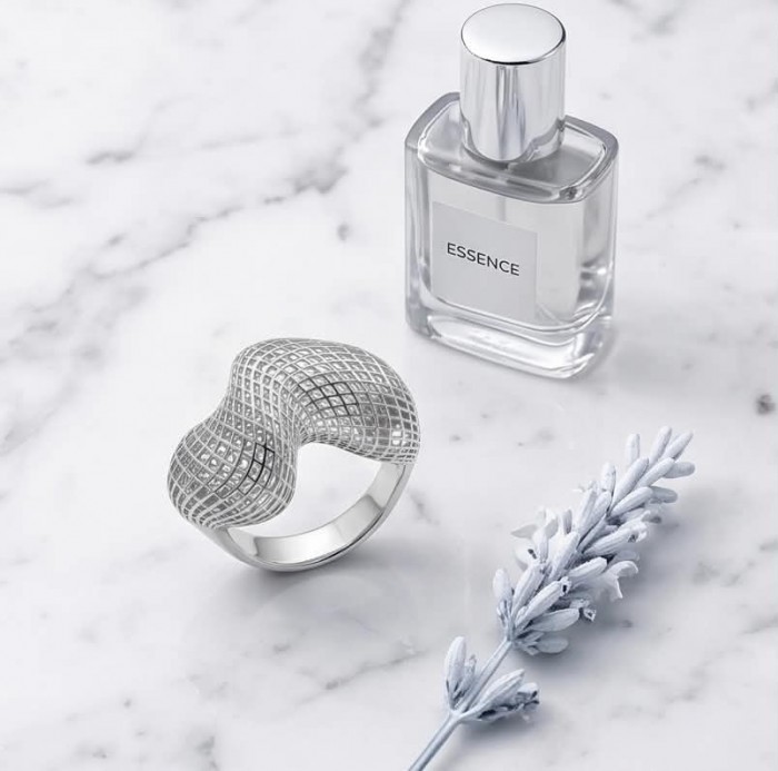 Eternity Bali made .925 Sterling Silver ring size 7 - Silver ring with grid pattern, bottle, and lavender on marble background