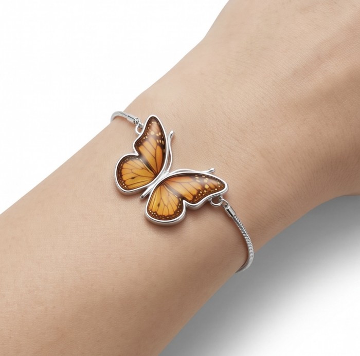 Golden Butterfly Genuine carved Baltic Amber rhodium over .925 Sterling Silver handamde Bracelet - Butterfly amber bracelet worn on wrist, top view.