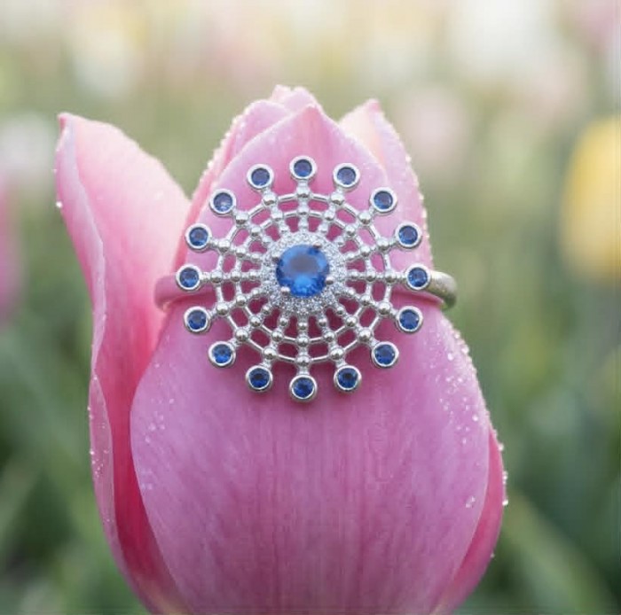Star 2.2 carat natural Sapphire .925 Sterling Silver Perfectly handcrafted Ring s. 7 - Sapphire ring on a pink tulip, top view showing intricate design.