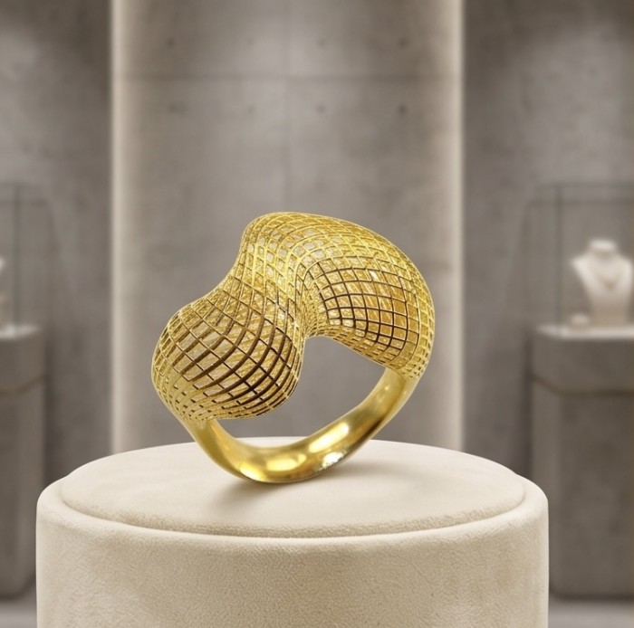 Dubai Style - .925 Sterling Silver dipped in 22K Gold handmade Large ring size 6 1/4 - Gold-patterned ring on display stand, front angle view.