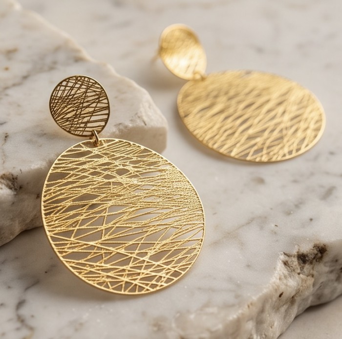 Dubai Style - .925 Sterling Silver dipped in 22K Gold handmade Earrings - Gold-plated earrings on marble, front view close-up.