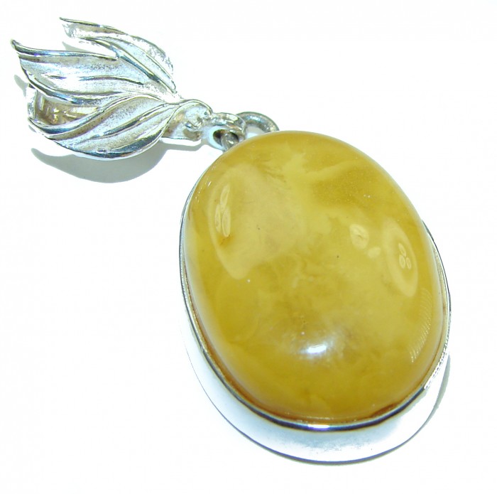 Prehistoric Authentic Buttescotch Baltic Amber 14K Gold over .925 Sterling Silver beautifully handcrafted Pendant - Close-up of butterscotch Baltic amber pendant with silver leaf design