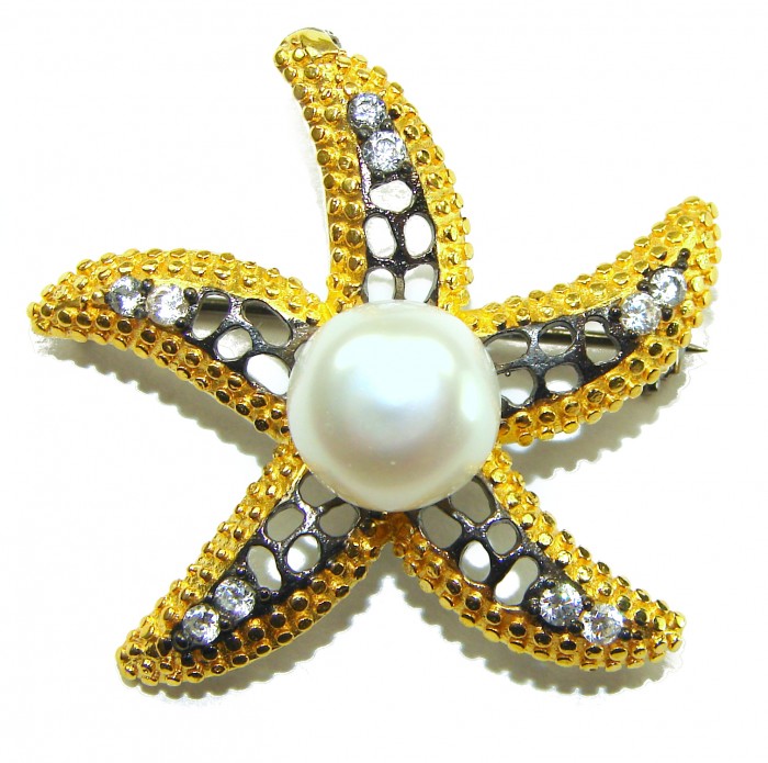 Genuine Mother of Pearl Ruby 14K Gold .925 Sterling Silver handmade Pendant Brooch - Gold starfish brooch with pearl detail, front view.