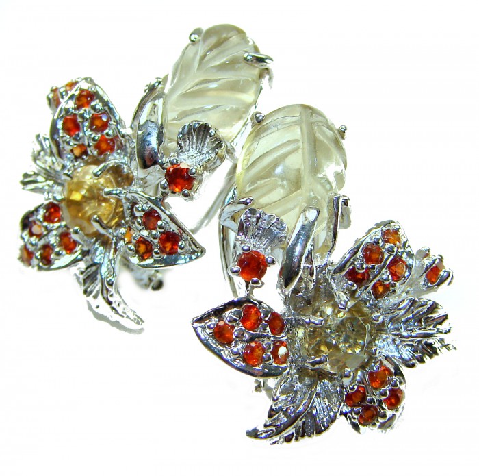 Vivien Luxurious Style Natural carved Citrine Granet .925 Sterling Silver handmade earrings - Close-up of carved citrine and garnet floral earrings in silver setting.