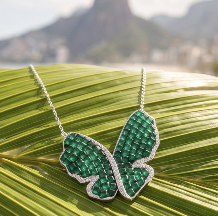 Precious Butterfly authentic 22.9 carat Colombian Emerald .925 Sterling Silver handcrafted Statement necklace - Colombian emerald butterfly necklace on palm leaf, front view