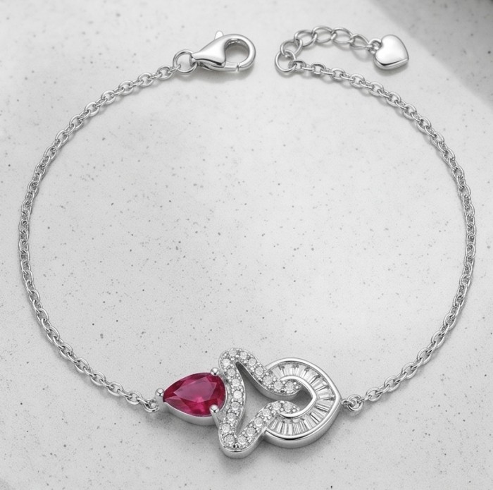 Giovanna - Magnificent Jewel 3.8 carat Ruby .925 Sterling Silver handcrafted incredible Statement Bracelet - Silver bracelet with heart clasp and ruby stone, top view.
