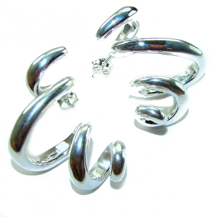 Spiral Italy made .925 Sterling Silver handcrafted Earrings - Spiral sterling silver earrings close-up, Italy made, .925 handcrafted.