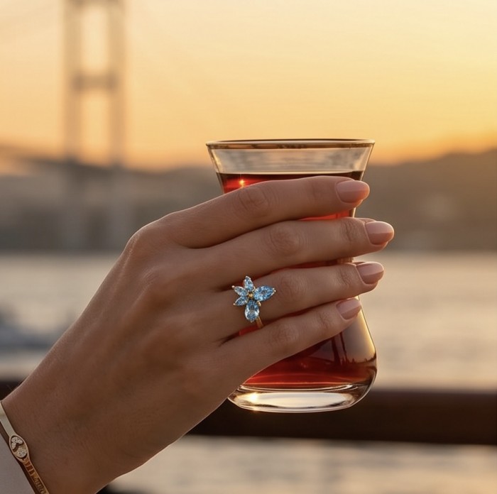 Pacifica 6.8 carat Swiss Blue Topaz 22K Gold over .925 Sterling Silver handcrafted ring size 8 - Worn on hand, sunset backdrop, Pacifica 6.8ct Blue Topaz 22K Gold ring