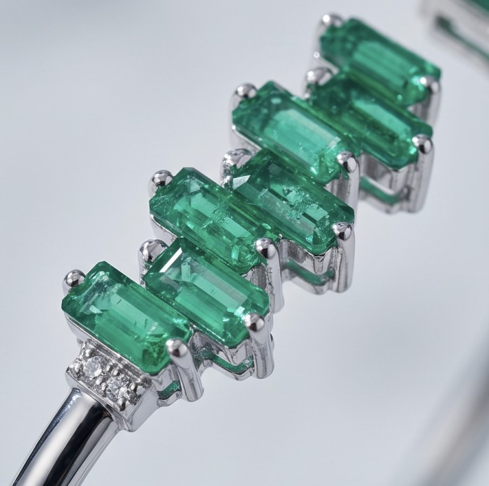 Art Deco 8.2 carat genuine Ruby .925 Sterling Silver handmade Statement Bracelet - Emerald stones close-up on Art Deco sterling silver jewelry