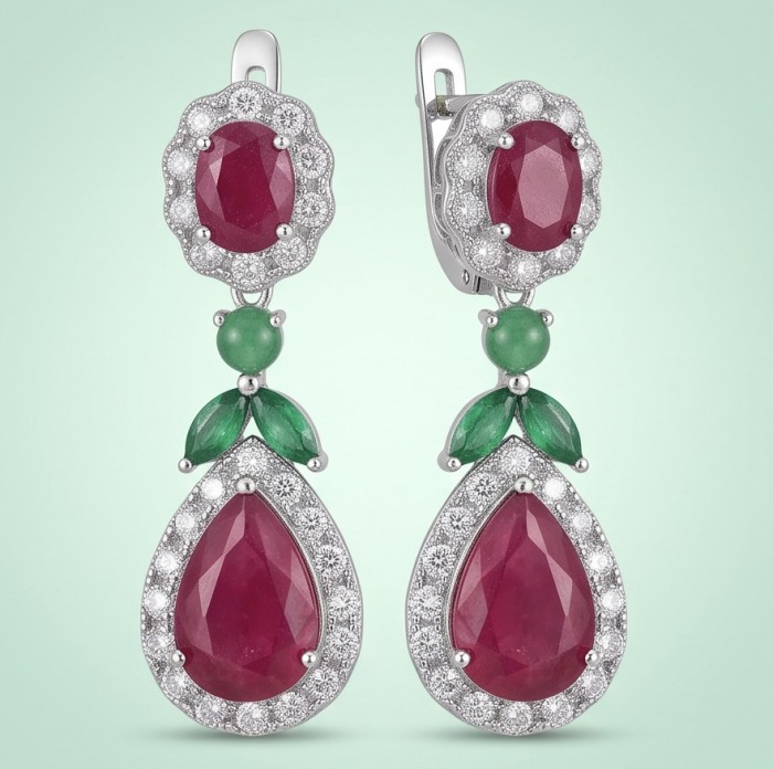 Bella Rossa - Magnificent Jewel 15.5 carat Mozambique Ruby .925 Sterling Silver dippedin Rhodium handcrafted earrings - Elegant ruby and emerald earrings front view on a soft green background