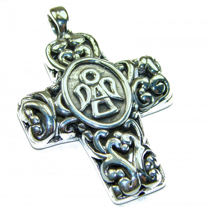 Protective angel - Holy Cross .925 Sterling Silver Pendant - Sterling silver cross pendant with intricate scrollwork, angled view.